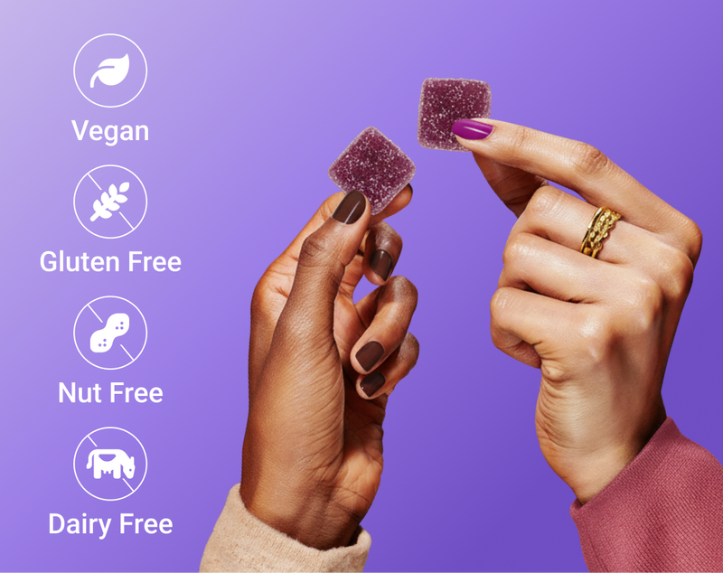 Hands holding purple Sleep + Vitamin gummies showing icons Vegan, Gluten Free, Nut Free, Dairy Free