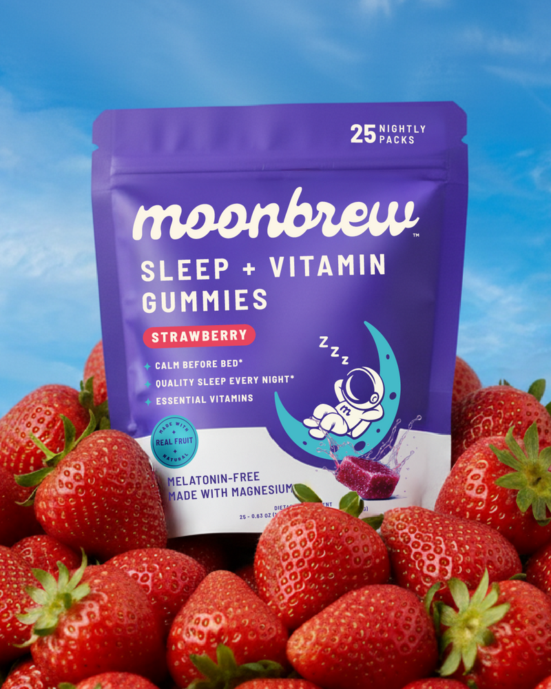 Front of Moonbrew Sleep + Vitamin Gummies pouch (strawberry) showing melatonin-free magnesium, with strawberries and sky