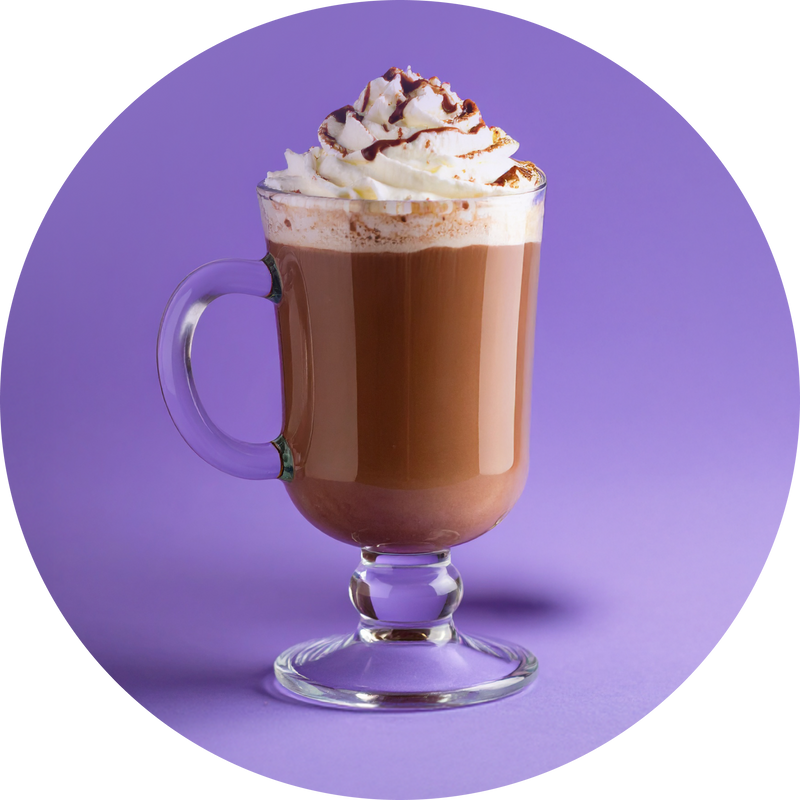 Front view of MoonBrew sleep drink in a footed glass topped with whipped cream and chocolate drizzle on purple background